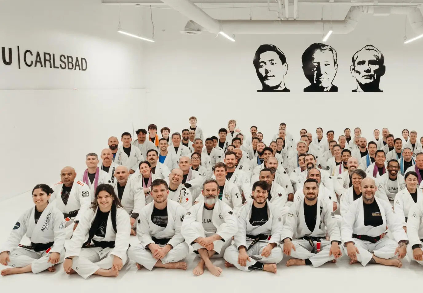 Alliance Jiu Jitsu Carlsbad team photo on the mats